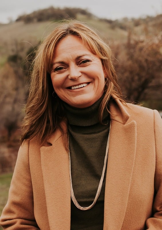 Realtor Nadia Dumas of Dumas Real Estate posing outdoors in Fairfield CA.