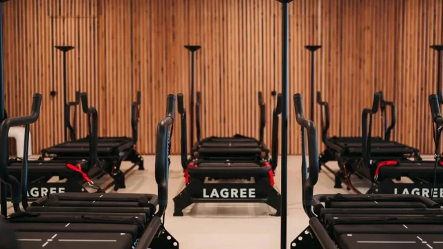 Interior of Reform Room Lagree fitness studio in Fairfield CA with exercise equipment.