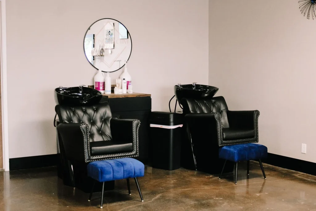 Modern salon interior with styling chairs at Salon Collective GV in Fairfield CA.