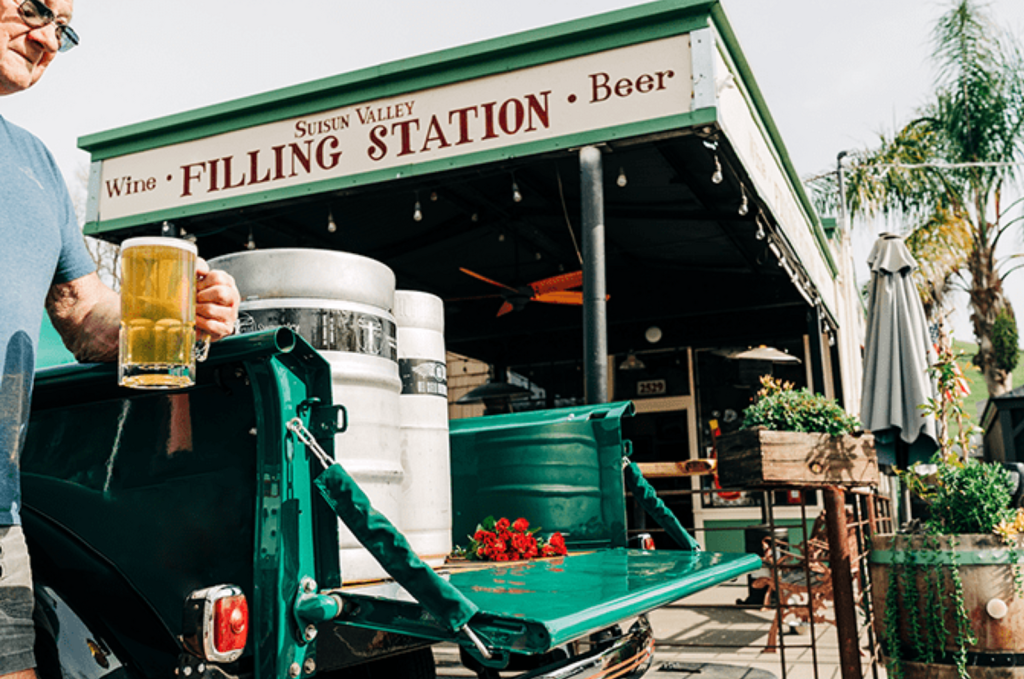 Vintage truck and outdoor tasting area at Suisun Valley Filling Station.